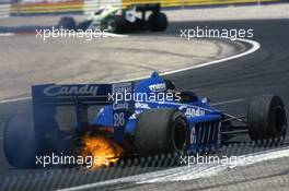 Jacques Laffite (FRA) Ligier JS25 Renault fire