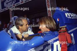 Jacques Laffite (FRA) Ligier talks with Gerard Larrousse (FRA)
