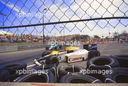 Nigel Mansell ' (GBR) Williams FW 10 Honda car after crash during race