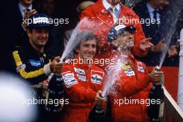 Elio de Angelis (ITA) Lotus 3rd position Alain Prost (FRA) McLaren 1st position Michele Alboreto (ITA) Ferrari 2nd position celebrates podium