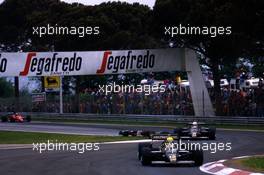 Ayrton Senna da Silva (BRA) Lotus 97T Renault leads teammate Elio de Angelis (ITA) 1st position at variante alta