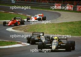 Ayrton Senna da Silva (BRA) Lotus 97T Renault leads Elio de Angelis (ITA) Lotus 97T Renault 1st position at Variante Acque Minerali
