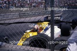 Nigel Mansell (GBR) Williams FW10 Honda after the crash