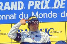 Nelson Piquet (BRA) Brabham BT54 Bmw 1st position celebrates podium and Pirelli tyres