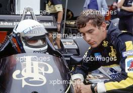 Ayrton Senna da Silva (BRA) Lotus Renault 97T talks with Elio de Angelis same team