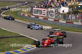 Michele Alboreto (ITA) Ferrari 156/85 leads the teammate Stefan johansson (SWE)