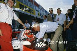 Gianni Agnelli (ITA) Ferrari  talks with Niki Lauda (AUT) McLaren  Franco Listro