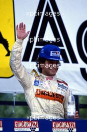 Pierluigi Martini (ITA) Ralt RT30 Ford Cosworth Pavesi Racing 1st position celebrate on podium