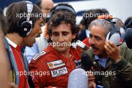 Alain Prost (FRA) McLaren MP4/2C Tag Porsche 1st position talks with Rai journalist Ezio Zermiani