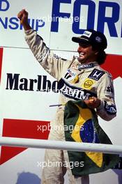 Nelson Piquet (BRA) Williams 1st position celebrates podium
