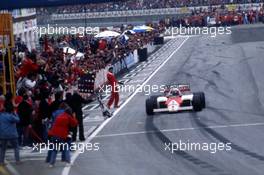 Alain Prost (FRA) McLaren MP4/2C Tag Porsche 1st position takes chequered flag without fuel