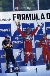 Ayrton Senna da Silva (BRA) Lotus 2nd position Nigel Mansell (GBR) Williams 1st position Stefan Johansson (SWE) Ferrari 3rd position celebrates podium