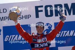 Nigel Mansell (GBR) Williams 1st position celebrate podium