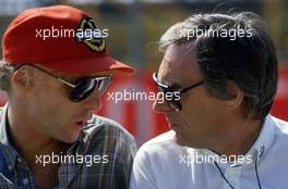 Niki Lauda (AUT) talks with Bernie Ecclestone (GBR) Brabham