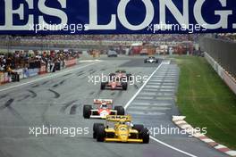 Ayrton Senna da Silva (BRA) Lotus 99T Honda 2nd position leads Alain Prost (FRA) McLaren MP4/3 Tag Porsche