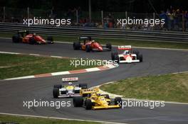 Ayrton Senna da Silva (BRA) Lotus 99T Honda 2nd position leads Nigel Mansell (GBR) Williams FW11B Honda 1st position