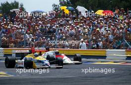Formula One Championship 1987 - GP F1 Suzuka - Nigel Mansell (gbr) Williams FW11b Judd - Canon Williams Team lead Alain Prost (fra) Marlboro Mclaren Honda