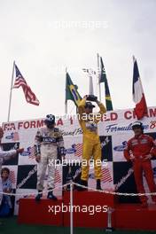Ayrton Senna da Silva (BRA) Lotus  1st position ,Nelson Piquet (BRA) Williams 2nd position and Alain Prost (FRA) McLaren 3rd position celebrate podium