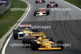 Ayrton Senna da Silva (BRA) Lotus 99T Honda 2nd position leads Nigel Mansell (GBR) Williams FW11B Honda 1st position