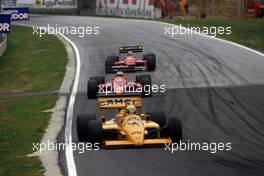 Ayrton Senna da Silva (BRA) Lotus 99T Honda 2nd position leads Michele Alboreto (ITA) Ferrari F187 3rd position