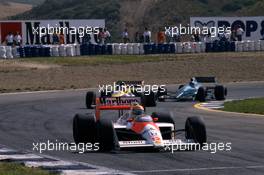 Ayrton Senna da Silva (BRA) McLaren MP4/4 Honda leads a group