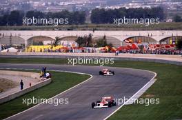 Ayrton Senna da Silva (BRA) McLaren MP4/4 Honda leads teammate Alain Prost (FRA) 1st position
