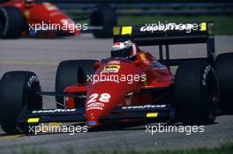 Gerhard Berger (AUT) Ferrari F187/88C 2nd position leads teammate Michele Alboreto (ITA)
