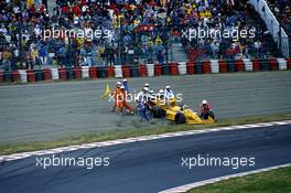 Nelson Piquet (BRA) Lotus 100T Honda in the gravel