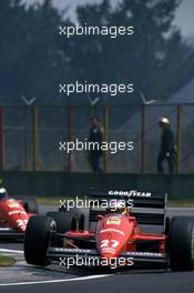 Michele Alboreto (ITA) Ferrari F187/88C leads teammate Gerhard Berger (AUT) 3rd position