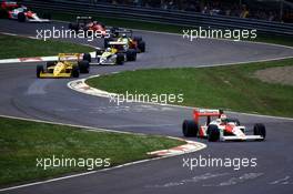 Ayrton Senna da Silva(BRA) McLaren MP4/4 Honda 1st position leads Nelson Piquet (BRA) Lotus 100 Honda at Variante Acque Minerali