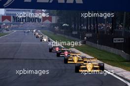 Nelson Piquet (BRA) Lotus 100T Honda leads a group