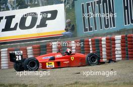 Gerhard Berger (AUT) Ferrari F187/88C in the gravel