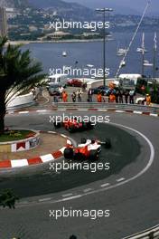 Gerhard Berger (AUT) Ferrari F187/88C 2nd position leads Alain Prost (FRA) McLaren MP4/4 Honda 1st position