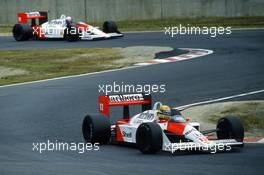 Ayrton Senna da Silva(BRA) McLaren MP4/4 Honda 1st position lead teammate Alain Prost (FRA) 2nd position