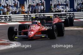 Gerhard Berger (AUT) Ferrari F187/88C 1st position leads team mate Michele Alboreto (ITA) 2nd position