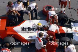Ayrton Senna da Silva (BRA) McLaren MP4/4 Honda 2nd position in the pit lane