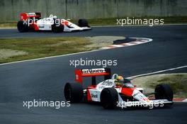 Ayrton Senna da Silva (BRA) McLaren MP4/4 Honda 1st position leads teammate Alain Prost (FRA) 2nd position