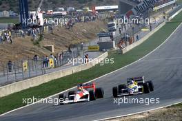 Ayrton Senna da Silva (BRA) McLaren MP4/4 Honda battles with Nigel Mansell (GBR) Williams FW12 Honda 2nd position
