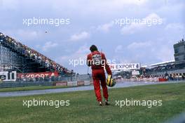 Ayrton Senna da Silva (BRA) McLaren MP4/5 Honda walk to pits