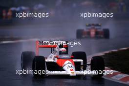 Alain Prost (FRA) McLaren MP4/5 Honda 2nd position leads Gerhard Berger (AUT) Ferrari 640