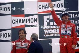 Ayrton Senna da Silva (BRA) McLaren 1st position, Alain Prost (FRA) McLaren 2nd position celebrates podium