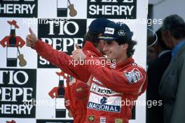Ayrton Senna da Silva (BRA) McLaren1st position celebrates podium