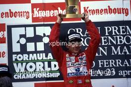 Ayrton Senna da Silva (BRA) McLaren MP4/5 Honda 1st position celebrates on podium