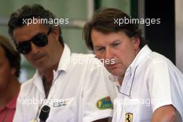 John Barnard (GBR) Ferrari and Flavio Briatore (ITA) Benetton