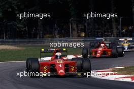 Alain Prost (FRA) Ferrari 641 2nd position leads teammate Nigel Mansell (GBR)