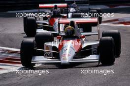 Ayrton Senna da Silva (BRA) McLaren MP4/5B Honda 1st position leads teammate Gerhard Berger (AUT) 3td position at prima variante