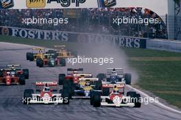 Ayrton Senna da Silva (BRA) McLaren MP4/5B Honda leads teammate Gerhard Berger (AUT) 2nd position at Tosa corner