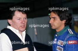 Nelson Piquet (BRA) talks with John Barnard (GBR)