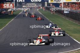Ayrton Senna da Silva (BRA) McLaren MP4/5B Honda 1st position leads teammate Gerhard Berger (AUT) 3rd position at parabolica corner
