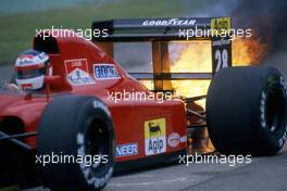 Jean Alesi (FRA) Ferrari 642 fire during qualifiyng